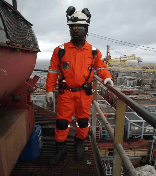 Oil and gas offshore platform at sunset